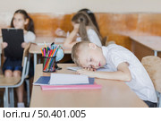 boy sleeping during lesson school. Стоковое фото, агентство Ingram Publishing / Фотобанк Лори