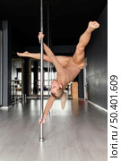 female performance pole dance 2. Стоковое фото, агентство Ingram Publishing / Фотобанк Лори