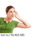 Woman listening something with hand on the ear, isolated on white. Стоковое фото, агентство Ingram Publishing / Фотобанк Лори