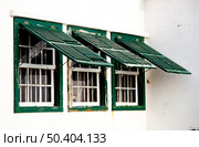Three green windows. Стоковое фото, агентство Ingram Publishing / Фотобанк Лори