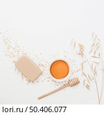 elevated view soap honey honey dipper hush white surface. Стоковое фото, агентство Ingram Publishing / Фотобанк Лори