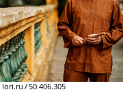front view man holding incense temple. Стоковое фото, агентство Ingram Publishing / Фотобанк Лори