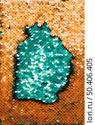 full frame abstract background green golden reflective sequins. Стоковое фото, агентство Ingram Publishing / Фотобанк Лори