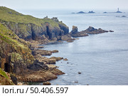 The view of Dr Syntax's Head and the Longships Lighthouse in the distance. Cornwall. England. GB. (2009 год). Стоковое фото, фотограф Сергей Пристяжнюк (Serg Zastavkin) / Фотобанк Лори