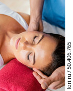 male osteopathic therapist checking female patient s neck spine. Стоковое фото, агентство Ingram Publishing / Фотобанк Лори