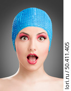 Portrait of a beautiful woman wearing a swim cap. Стоковое фото, агентство Ingram Publishing / Фотобанк Лори