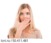 Beautiful blonde woman astonished with something with her hand in front of the mouth, isolated over white background. Стоковое фото, агентство Ingram Publishing / Фотобанк Лори