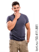Handsome latin man smiling, isolated over a white background. Стоковое фото, агентство Ingram Publishing / Фотобанк Лори