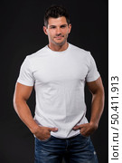 Handsome latin man standing over a white background. Стоковое фото, агентство Ingram Publishing / Фотобанк Лори