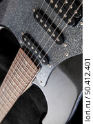 soundboard of an electric guitar close-up. shape of stratocaster, humbucker and 2 singles. Стоковое фото, агентство Ingram Publishing / Фотобанк Лори