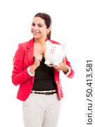 Business woman holding a piggy bank on the hands, isolated over a white background. Стоковое фото, агентство Ingram Publishing / Фотобанк Лори