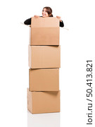 Happy business woman appear inside big card boxes, isolated over white background. Стоковое фото, агентство Ingram Publishing / Фотобанк Лори