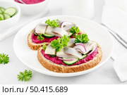 Sandwiches, toasts with salted herring and beetroot pate. Стоковое фото, агентство Ingram Publishing / Фотобанк Лори