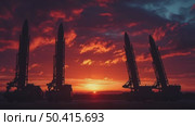Military Missile Launchers Silhouetted Against Vibrant Sunset Sky. Стоковое AI-видео, аниматор Юлия Гапеенко / Фотобанк Лори