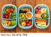 top view packed food wooden table. Стоковое фото, агентство Ingram Publishing / Фотобанк Лори