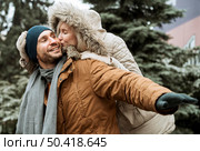 couple winter fooling around together. Стоковое фото, агентство Ingram Publishing / Фотобанк Лори