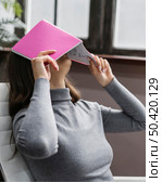 bored businesswoman working from home. Стоковое фото, агентство Ingram Publishing / Фотобанк Лори