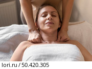close up woman experiencing massage. Стоковое фото, агентство Ingram Publishing / Фотобанк Лори