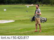 full shot adult man golf course. Стоковое фото, агентство Ingram Publishing / Фотобанк Лори