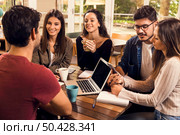 Group of friends studying together for finals. Стоковое фото, агентство Ingram Publishing / Фотобанк Лори