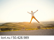 Man in outdoor running and jumping. Стоковое фото, агентство Ingram Publishing / Фотобанк Лори