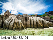 The beautiful Anse Source D’Argent beach in La Digue Island, Seychelles. Стоковое фото, агентство Ingram Publishing / Фотобанк Лори