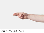 Horizontal male hand finger alphabet H letter in finger alphabet sign language, 2, two fingers, imagining hand pistol isolated on white background.. Male hand sign language H on white. Стоковое фото, агентство Ingram Publishing / Фотобанк Лори