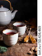 high angle tea cups with crystallized sugar. Стоковое фото, агентство Ingram Publishing / Фотобанк Лори