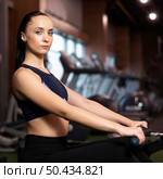 medium shot woman working out. Стоковое фото, агентство Ingram Publishing / Фотобанк Лори