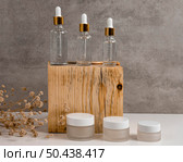 front view skin oil droppers face cream recipients. Стоковое фото, агентство Ingram Publishing / Фотобанк Лори