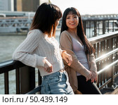 pretty asian girls posing together 6. Стоковое фото, агентство Ingram Publishing / Фотобанк Лори