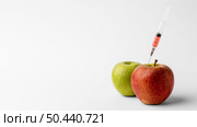 delicious apple gmo modified food 3. Стоковое фото, агентство Ingram Publishing / Фотобанк Лори