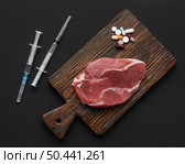 gmo modified meat pills. Стоковое фото, агентство Ingram Publishing / Фотобанк Лори