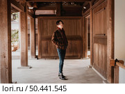 man posing japanese building. Стоковое фото, агентство Ingram Publishing / Фотобанк Лори