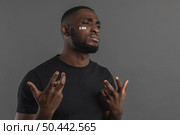 upset american black person. Стоковое фото, агентство Ingram Publishing / Фотобанк Лори