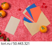 chinese new year with mandarines 9. Редакционное фото, агентство Ingram Publishing / Фотобанк Лори