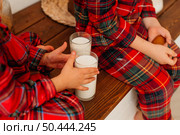 high angle children wanting drink milk. Стоковое фото, агентство Ingram Publishing / Фотобанк Лори
