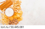 top view beer mug snacks. Стоковое фото, агентство Ingram Publishing / Фотобанк Лори