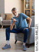 senior male training home. Стоковое фото, агентство Ingram Publishing / Фотобанк Лори