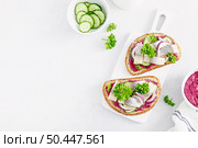 Sandwiches, toasts with salted herring and beetroot pate, top view. Стоковое фото, агентство Ingram Publishing / Фотобанк Лори