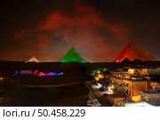 The Pyramids and the Sphinx in the night lights, Giza, Egypt. Sphinx in the night lights. Стоковое фото, агентство Ingram Publishing / Фотобанк Лори