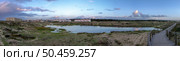 OVAR, PORTUGAL - 20 DECEMBER 2022: Heavy rainfall causes the water table to rise to the seafront of Furadouro in Ovar. The advance of the sea due to climate change threatens Portugal. Стоковое фото, агентство Ingram Publishing / Фотобанк Лори