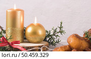 Candles of different colors with Christmas decoration. Стоковое фото, агентство Ingram Publishing / Фотобанк Лори