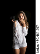 Fashion Portrait of young Woman photographer with camera. Стоковое фото, агентство Ingram Publishing / Фотобанк Лори