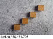 Wooden blocks, used for domino games, Arranged in steps. Стоковое фото, агентство Ingram Publishing / Фотобанк Лори