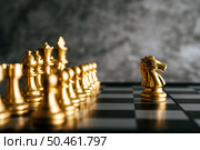 Gold Chess on chess board game for business metaphor leadership concept . Стоковое фото, агентство Ingram Publishing / Фотобанк Лори