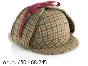 British Deerhunter or Sherlock Holmes cap on white background. Стоковое фото, агентство Ingram Publishing / Фотобанк Лори