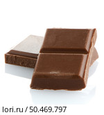 Closeup detail of chocolate parts on white background. Стоковое фото, агентство Ingram Publishing / Фотобанк Лори