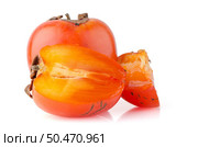 Ripe persimmons on white background. Стоковое фото, агентство Ingram Publishing / Фотобанк Лори