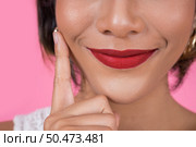 Close up Fashion woman red lips big smile. Стоковое фото, агентство Ingram Publishing / Фотобанк Лори